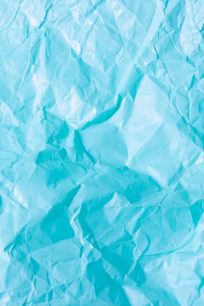 Fundo azul abstrato. Papel artesanal multicolorido espremido — Fotografia de Stock