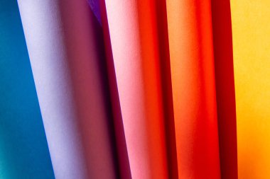 Soyut çok renkli geometrik kağıt arka plan. Sarı, pembe, mavi renk. Parlak renkli kağıt arkaplanı