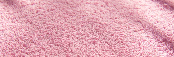 Light pink soft, fluffy, light blanket. Texture cotton textile background. Banner