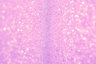 Abstract lilac trendy backdrop. Sparkling background made of lights. Festive blurred backdrop