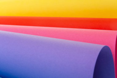 Soyut çok renkli geometrik kağıt arka plan. Sarı, pembe, mavi renk. Parlak renkli kağıt arkaplanı