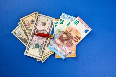 Flat lay of banknotes of money dollars and euro,  exchange rate, world economy, currency, copy space