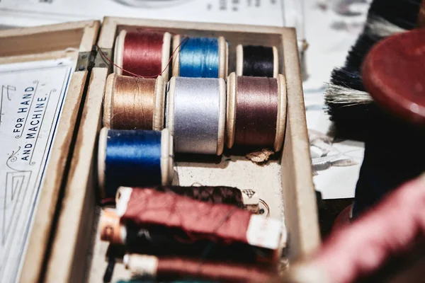 Vintage sewing threads. Selective focus on the threads. Close up.