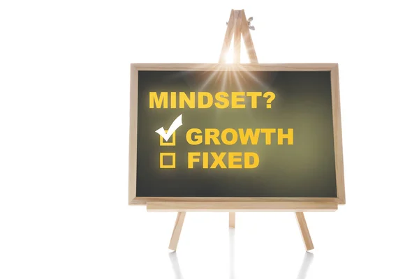 Growth or fixed mindset decision with check mark on check box on chalkboard on white background. List selection development challenge concept and opportunity success idea