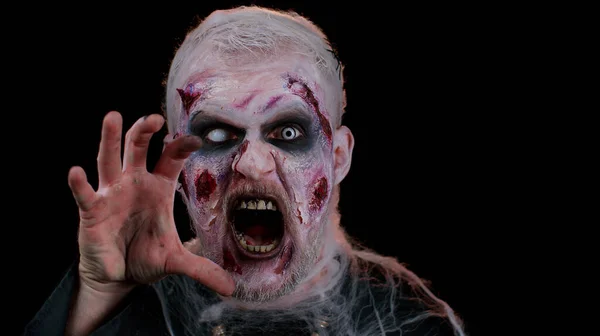 Ijesztő ember Halloween zombi véres sebesült smink, arc ijesztő kifejezések, görcsök — Stock Fotó