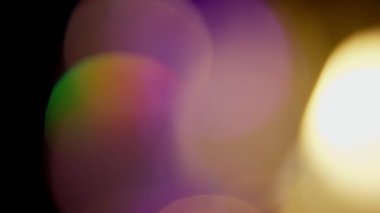 Projeler için ışık sızıntısı 4K görüntü, optik parlaklık lensi bokeh geçiş arkaplanı örtüyor