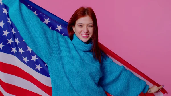 Cheerful teen girl waving and wrapping in American USA flag, celebrating, human rights and freedoms — Stock Photo, Image