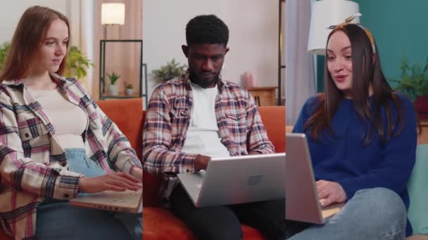 Młodzi dorośli ludzie w biurze używać laptopa wpisując przeglądanie powiedzieć wow tak okazało się wielkie zwycięstwo — Wideo stockowe