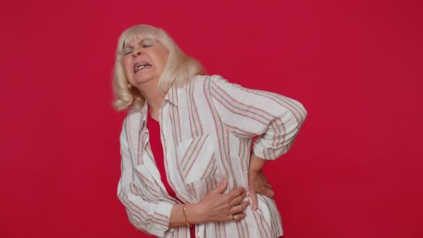 Senior ill woman suffering backache discomfort unbearable spasm torn muscles, tendons kidney stones — Stock video