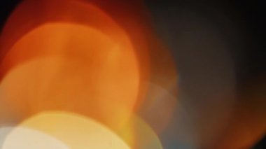 Projeler için ışık sızıntısı 4K görüntü, optik parlaklık lensi bokeh geçiş arkaplanı örtüyor