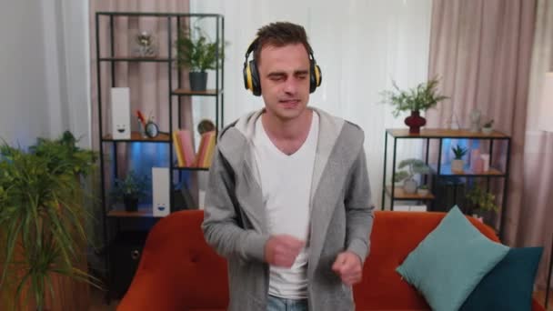 Overjoyed Caucasian Man Wireless Headphones Dancing Singing Living Home Flat — Stock Video