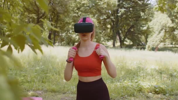 Athletic Girl Headset Helmet Making Fitness Box Exercises Dumbbells Outdoor — Stock Video