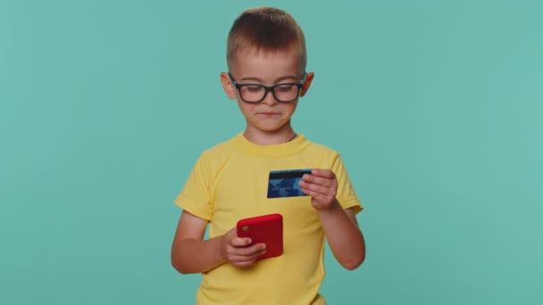 Little Toddler Children Boy Yellow Shirt Using Credit Bank Card — Stockvideo