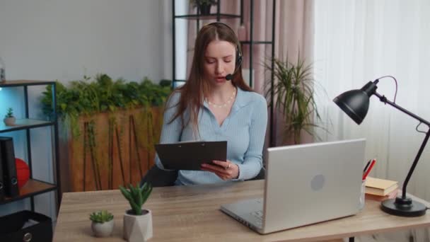 Young Business Woman Sitting Desk Home Office Wearing Headset Freelance — Stockvideo