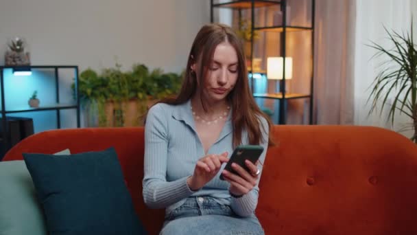 Young Woman Use Mobile Smartphone Typing Browsing Say Wow Yes — Video Stock