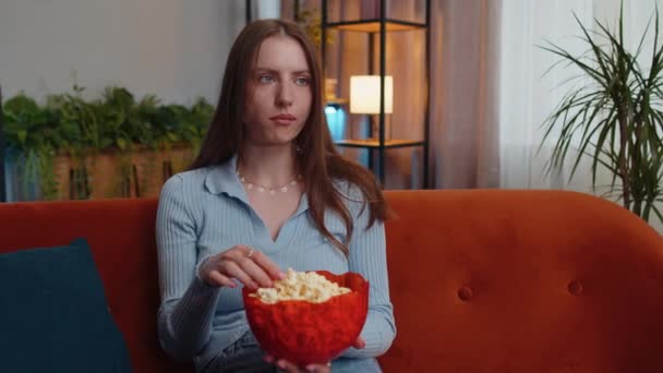 Excited Young Pretty Woman Sitting Sofa Eating Popcorn Watching Interesting — Vídeos de Stock