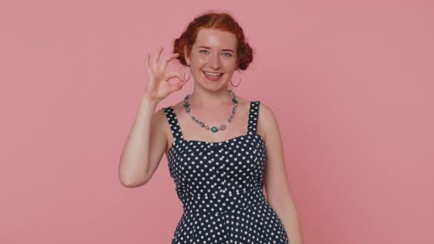 Happy Young Woman Polkadot Dress Looking Approvingly Camera Showing Gesture — Video Stock
