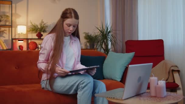 Sad Teen Child Girl Working Online Laptop Analysing Paperwork Graphs — Vídeo de Stock