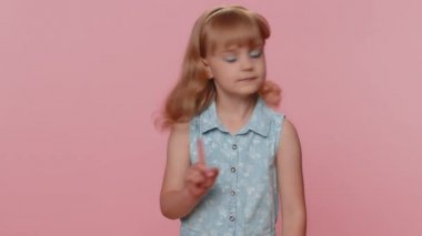 Displeased upset young preteen child girl kid reacting to unpleasant awful idea, dissatisfied with bad quality, wave hand, shake head No, dismiss idea, dont like proposal. Little toddler children