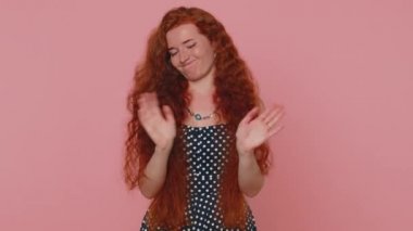 I am dont want it, not me. Confused redhead woman pointing fingers herself ask say who why me no thanks i do not need it, rejection, refusal, stop sign. Ginger girl with freckles on pink background
