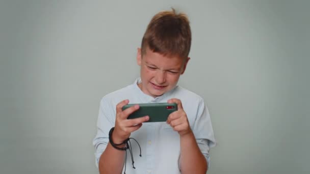 Worried Funny Addicted Children Boy Enthusiastically Playing Racing Video Games — Vídeo de stock