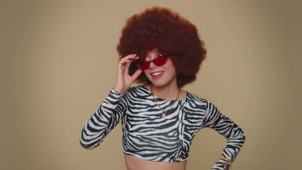 Happy Young Woman Brown Lush Wig Listening Music Dancing Disco — Stockvideo