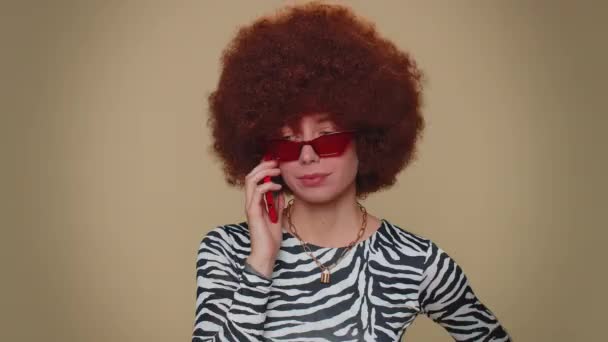 Tired Young Woman Brown Lush Wig Making Online Conversation Speaks — Vídeo de stock