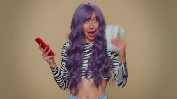 Happy Young Woman Lush Wig Looking Smartphone Display Sincerely Rejoicing — 图库视频影像