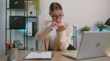 Businesswoman stock trader earning bitcoins after online monitoring trading operations. Increasing wealth financial prosperity. Professional freelancer woman working on laptop at office workplace desk