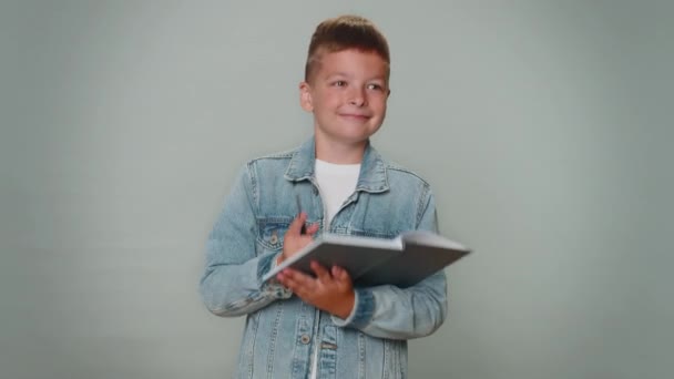 Thoughtful Toddler Kid Boy Jacket Making Notes Writing Thoughts Pen — Stockvideo