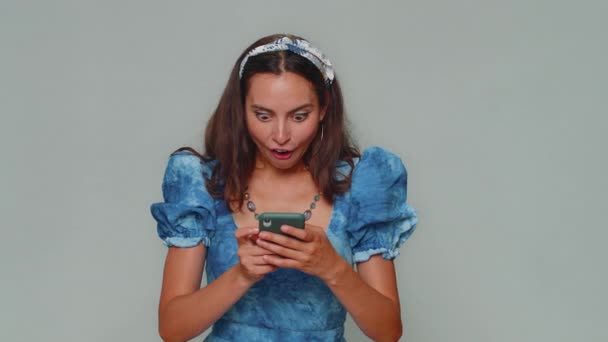 Happy Excited Joyful Young Woman Use Smartphone Typing Browsing Say — Video