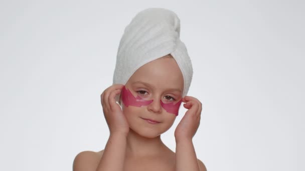 Beautiful Young Smiling Child Girl Towel Head Applying Pink Patches — Vídeos de Stock