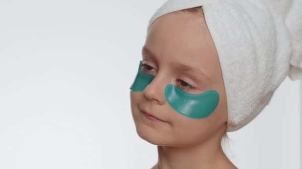 Beautiful Young Smiling Child Girl Towel Head Applying Blue Patches — Wideo stockowe