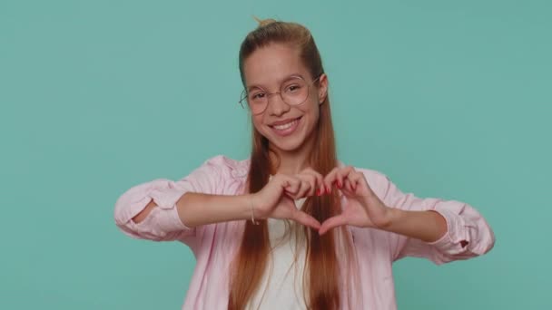 Love You Smiling Lovely Pretty Teenager Girl Makes Heart Gesture — Stock Video