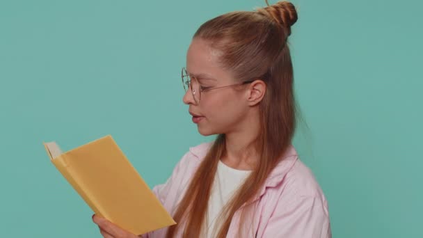 Pretty Teenager Young Girl Reading Funny Interesting Fairytale Story Book — Vídeo de Stock