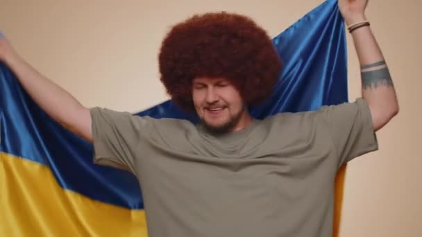 Handsome Man Hold Ukraine National Flag Hoping Success Smiling Kind — Video