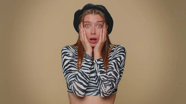 Stressed depressed woman terrified about danger problems, suffering phobia, anxiety disorder, expresses fear, waving no, insecure, stress, panic. Adult girl isolated on beige studio background indoors