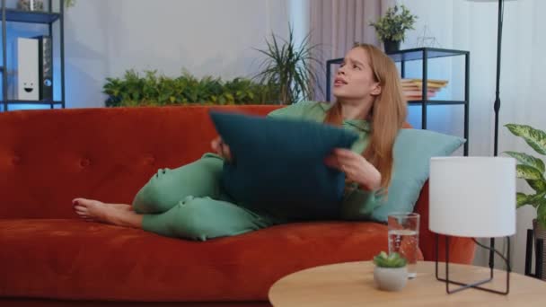 Repair Work Neighbours Concept Irritated Girl Sit Couch Cover Ears — Vídeo de stock