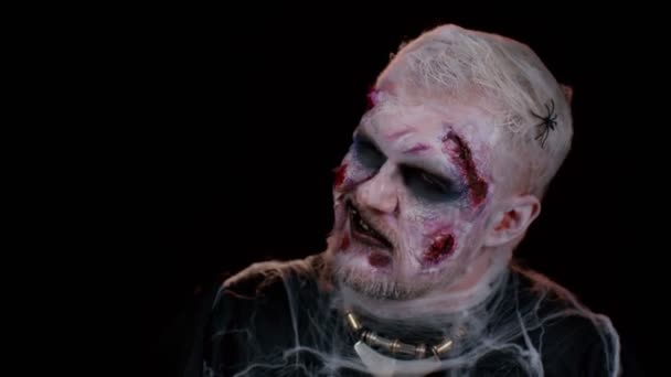 Frightening Man Halloween Zombie Bloody Wounded Makeup Trying Scare Face — Stock Video