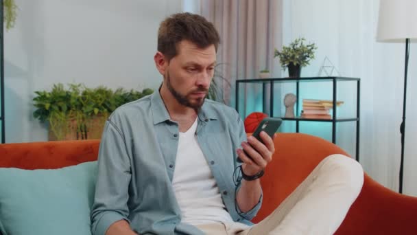 Handsome Man Using Credit Bank Card Smartphone While Transferring Money — Αρχείο Βίντεο