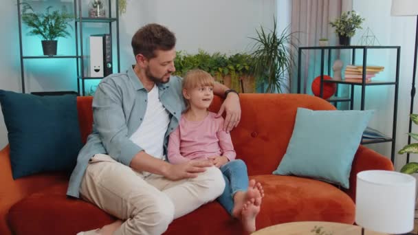 Young Loving Man Dad Talking Little Daughter Toddler Together Couch — Stok video