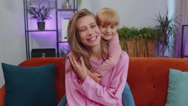 Pretty Smiling Cute Child Kid Daughter Embrace Mom Look Camera — Vídeos de Stock
