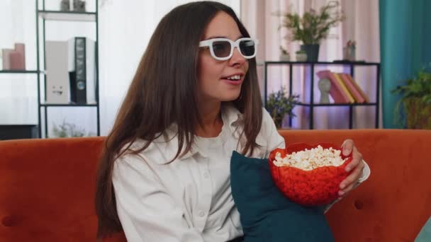 Excited Adult Girl Sitting Sofa Eating Popcorn Watching Interesting Serial — Stockvideo