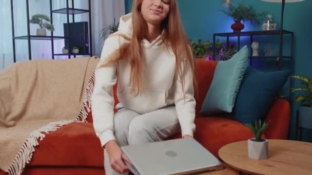 Lovely Adult Girl Freelancer Enters Home Living Room Sits Orange — Stockvideo