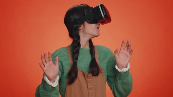 Young Woman Using Headset Helmet Play Simulation Game App Online — Stock Video