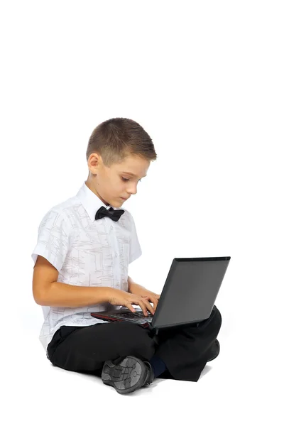 A boy and a laptop — Stock Photo, Image