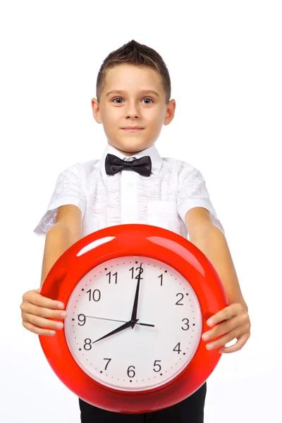 A boy and a clock — Stock Photo, Image