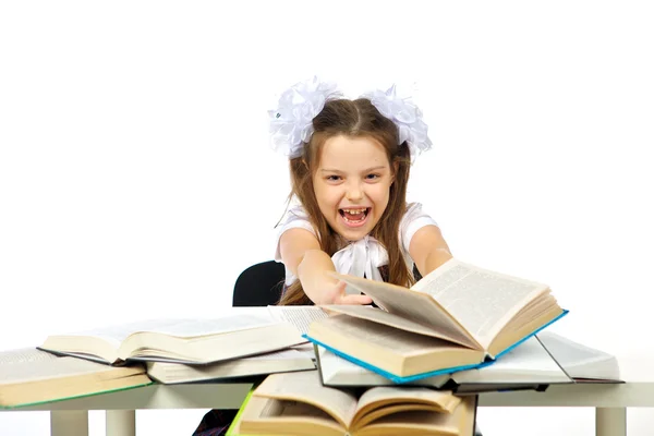 Uma menina e livros — Fotografia de Stock