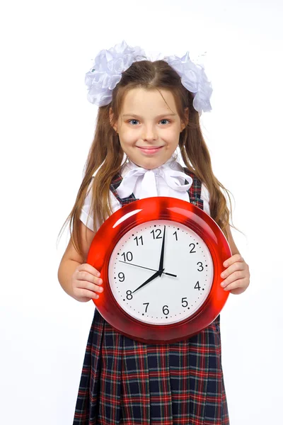 A girl and a clock — Stock Photo, Image