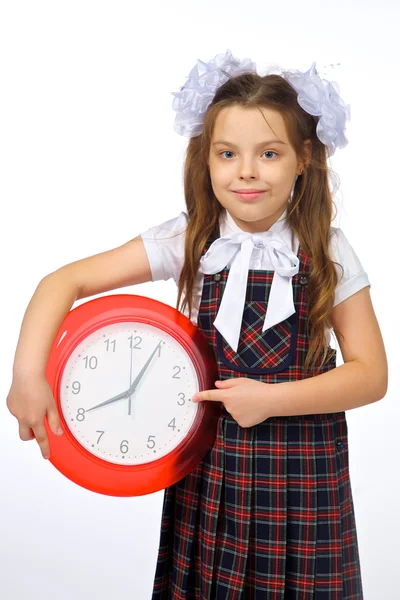 A girl and a clock — Stock Photo, Image